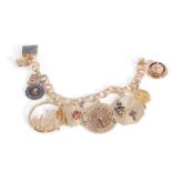 Gemstone and gold charm bracelet, with FBI charms