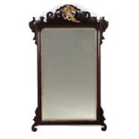 Chippendale style parcel-gilt carved mahogany mirror