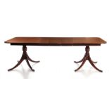 Regency style inlaid mahogany dining table