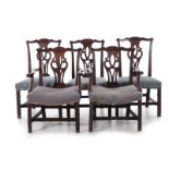 George III carved mahogany dining chairs (5pcs)