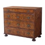 Continental marquetry-inlaid walnut chest of drawers