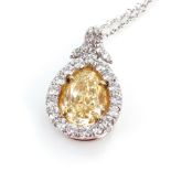 Fancy yellow diamond pendant on chain