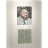 Brian Blessed signature piece mounted below colour photo. Dedicated. Overall size 12x10 Good