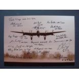 Bomber Command veterans signed photo. This 8 by 10 photo a Lancaster in flight has been signed by