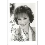 Shirley Maclaine signed b/w 6 x 4 inch photo, dedicated to Alan. Good condition.