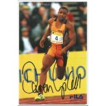 Darren Campbell Olympian signed Fila colour 6 x 4 inch photo of him running on a track. Good