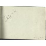 Motorsport autograph book. 34 signatures. Some of names included are Stirling Moss 2, Brian