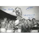 Aston Villa 1957 B/W 12 x 8 photo depicting Aston Villa captain Johnny Dixon holding aloft the FA