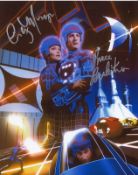 Bruce Boxleitner and Cindy Morgan signed 10 x 8 colour photo from Tron. Good condition. All signed