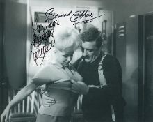 Barbara Windsor and Bernard Cribbins signed 10 x 8 b/w photo from Carry on film. Good condition. All