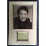 Cliff Richard autographed presentation. High quality professionally mounted 28cm x 50cm display