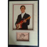 Hank Marvin autographed presentation. High quality professionally mounted 28cm x 50cm display