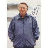 Sir Edmund Hillary signed 6 x 4 colour portrait of the first person to conquer Mount Everest. Good