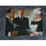 Hugh Frasier signed photo. Colour 8x10 photo from Poirot signed by Hugh Frasier. Good condition. All