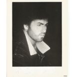 George Michael signed 10 x 8 b/w photo of a young Michael, inscribed to bottom border To Cassie love