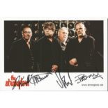 The Stranglers signed 8x5 colour photo. All four signed inc. Baz Warne, Jean-Jacques Burnel,