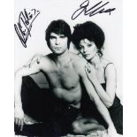 Joan Collins & Oliver Tobias signed 10 x 8 black and white photo. Brilliant photo from The Stud good