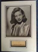 Lauren Bacall autographed presentation. High quality professionally mounted 28cm x 50cm display