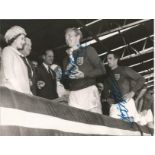 Bobby Moore and Geoff Hurst signed unusual 7 x 5 b/w photo collecting the World Cup from the