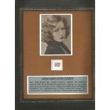 Greta Garbo memento display 12 x 10 inch mounted with a swatch of her personally worn tan sweater