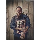 RAG N BONE MAN Singer signed 8x12 Photo. Good Condition. All signed items come with our