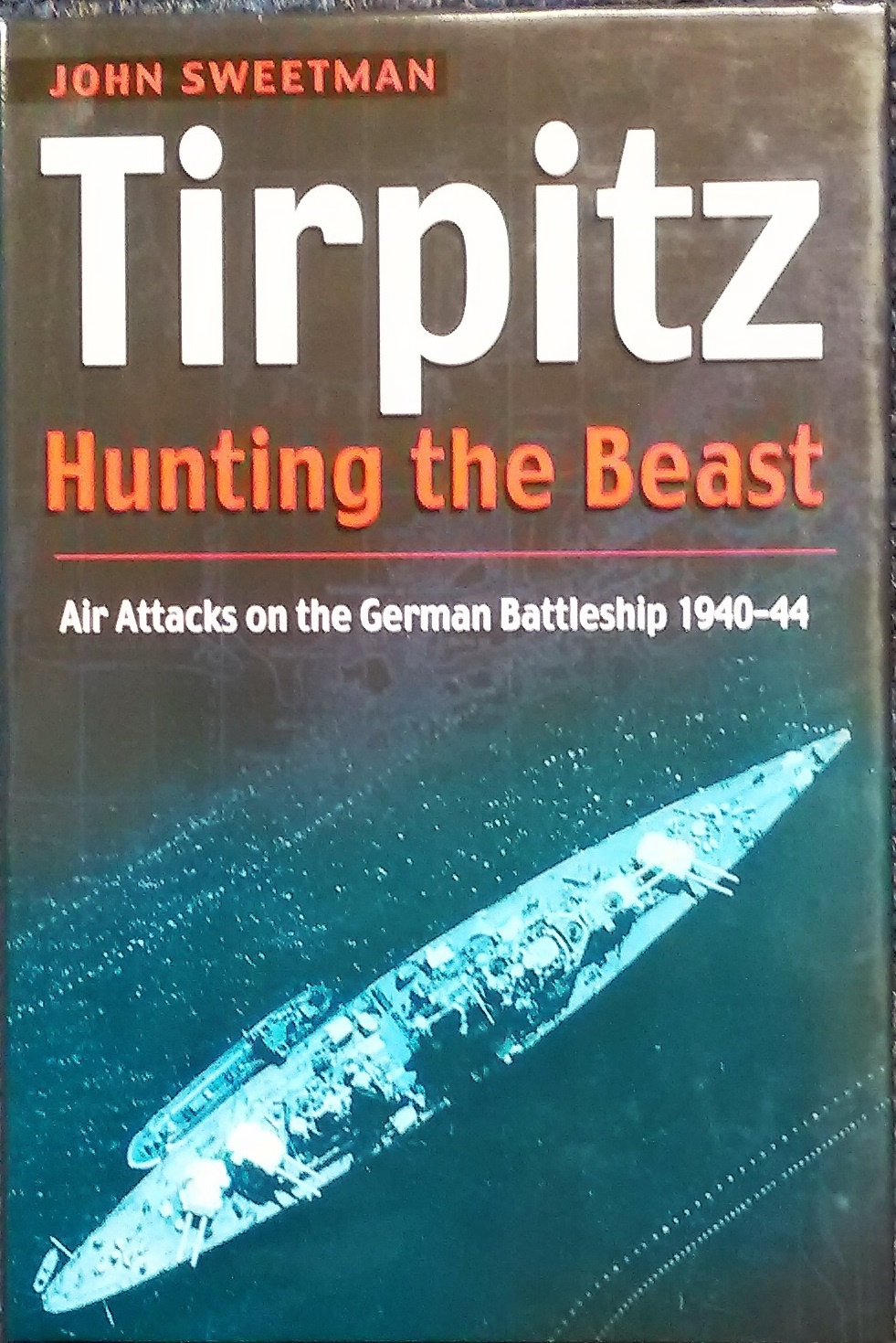 John Sweetman signed hardback book Tirpitz Hunting the Beast Air Attacks on the German Battleship