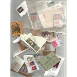 Assorted Countries used and mint stamps in mailing envelopes in carrier bag. Approx. 400+ unsorted