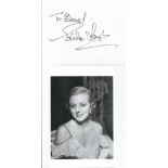Evelyn Keyes signed autograph album page to Beryl with 6 x 4 unsigned photo. Good Condition. All