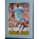 Gael Clichy signed colour football photo. mounted. In Man City strip. Good Condition. All signed