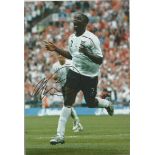 Micah Richards signed 12x8 colour football photo in England kit. Good Condition. All signed items