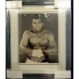 Muhammed Ali signed b/w photo. Dedicated. Framed to overall size 15x12 approx. Good Condition. All