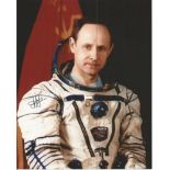 Anatoly Artsebarsky Cosmonaut signed 10 x 8 colour Space Suit photo. Good Condition. All signed