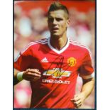 Morgan Schneiderlin signed 16x12 colour Man Utd football photo. Good Condition. All signed items