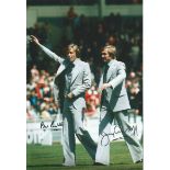 Brian And Jimmy Greenhoff Col, 12 X 8 Photo Depicting Man United Brian And Jimmy Greenhoff Taking