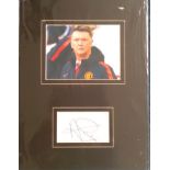 Louis Van Gaal signature piece mounted below colour football photo. Mounted to overall size of