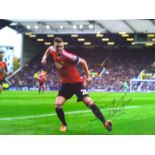 Morgan Schneiderlin signed 16x12 colour Man Utd football photo. Good Condition. All signed items