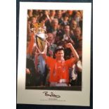 Bryan Robson signed 16x12 colour photo in Man Utd strip with the premiership trophy in 1994. Good