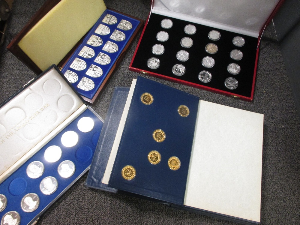 The Kings and Queens Collection, an album containing forty three silver gilt medallions, Pobjoy Mint