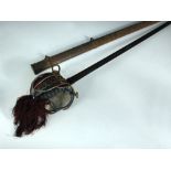 A Victorian Scottish basket hilt sword, standard pattern with steel basket and liner, the etched