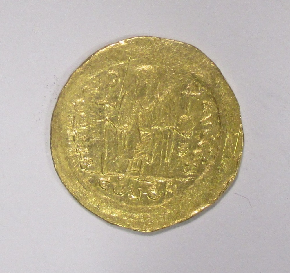 Justinian I (A.D. 527-565), Gold Solidus, ON IVSTINI-ANVS PP AVI, helmeted and cuirassed bust - Image 2 of 2