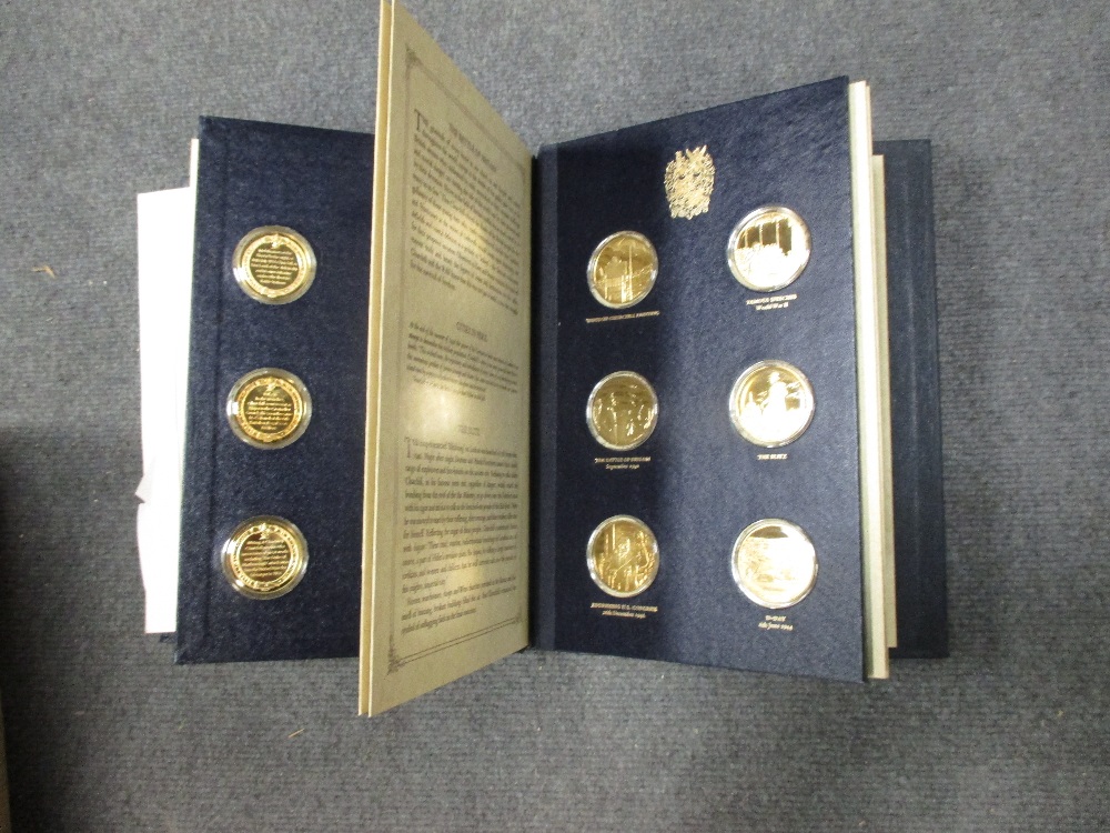 A set of Churchill Centenary Medals, twenty four 1oz silver gilt medallions, housed in a display