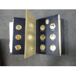 A set of Churchill Centenary Medals, twenty four 1oz silver gilt medallions, housed in a display