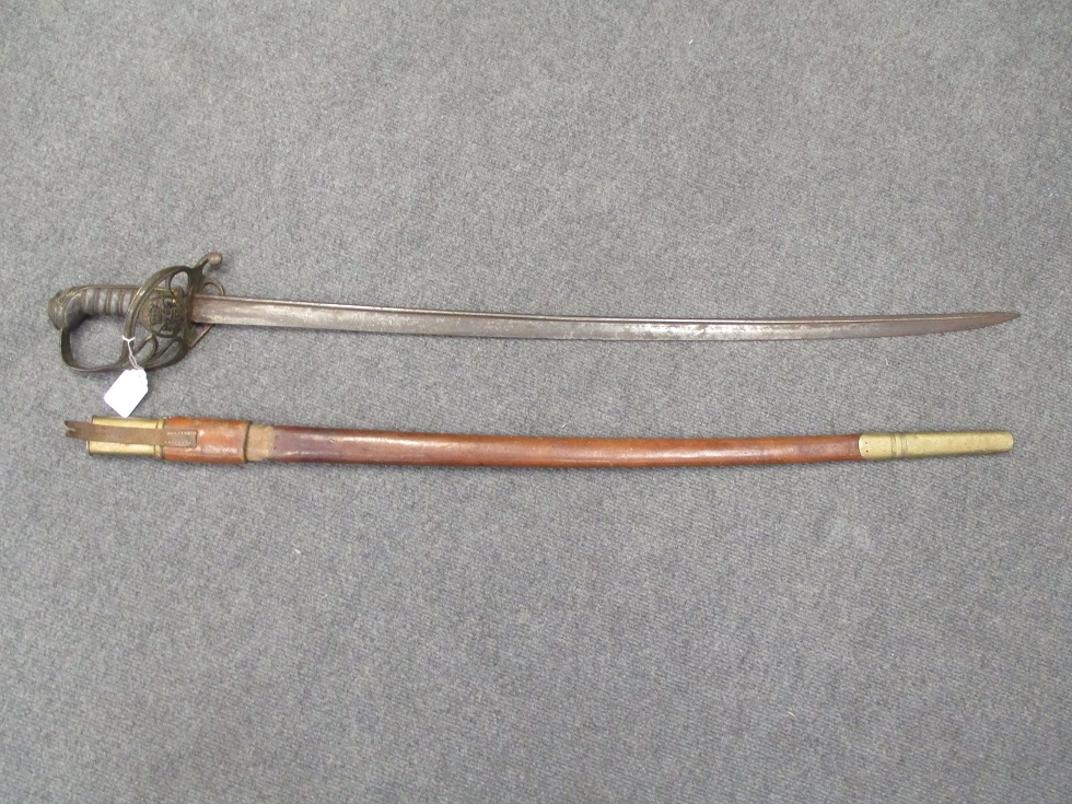 A George IV British 1822 pattern Infantry Officer's Sword, the blade of pipe back form with traces