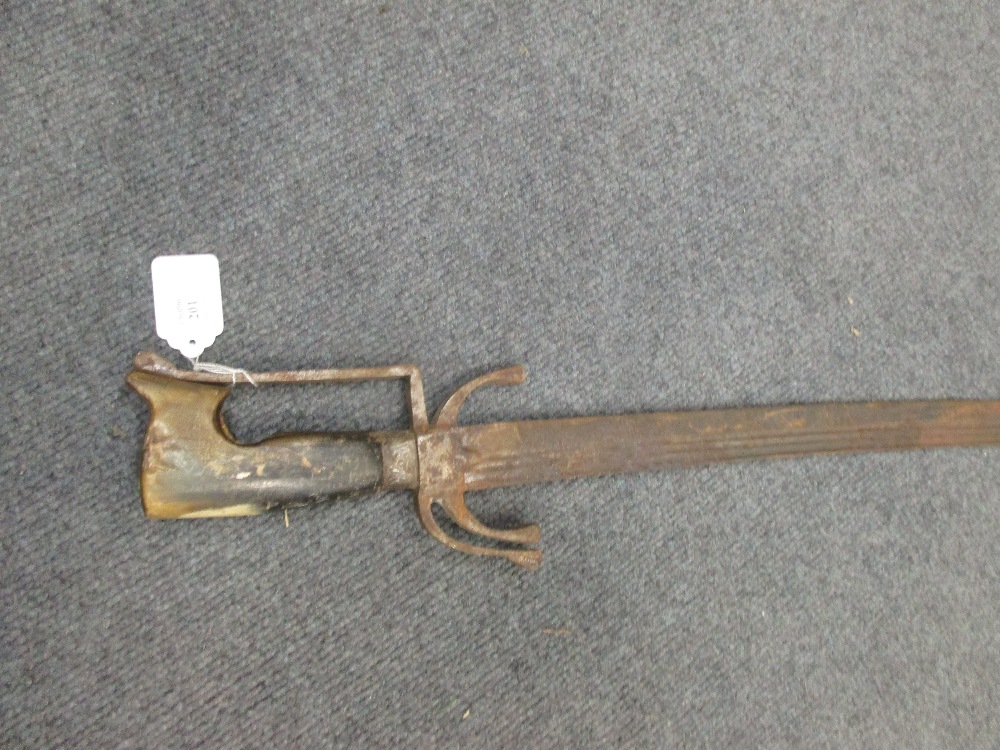 An Indian Tulwar, with heavy curved blade and silvered rams head pommel, together with an Eastern - Bild 3 aus 4