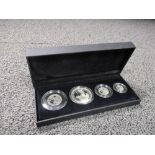 A Britannia four coin silver proof set, dated 2012, £2, £1, 50p and 20p, encapsulated and cased