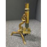 A brass theodolite by E.R. Watts & Son, London, No. 21301, in a fitted mahogany case, together