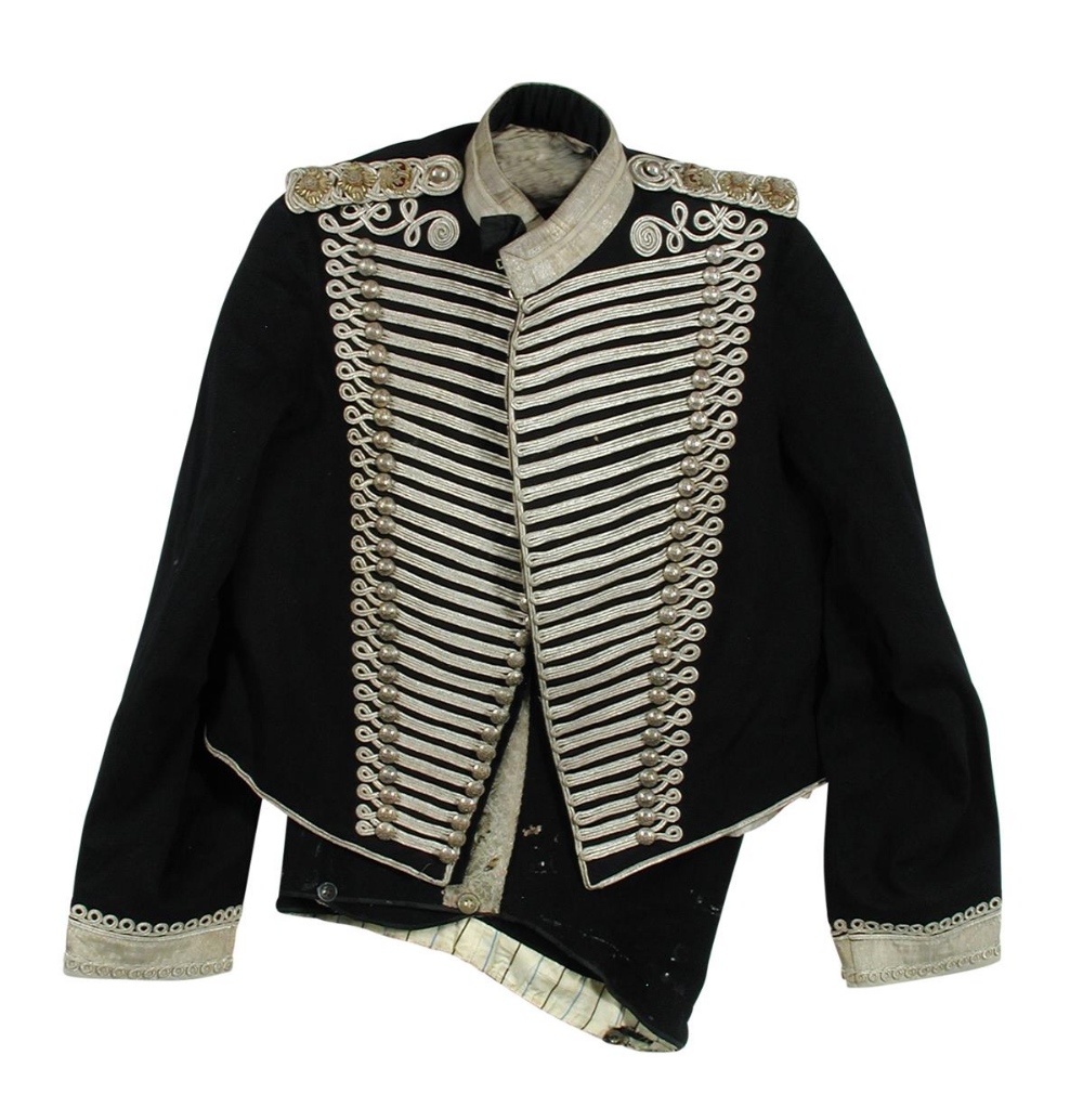 A late 19th century Hussar's dress uniform, the jacket with silver braid complete with epaulettes