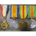 A World War One trio to 2038 Sgt W White, Essex R, and a 1939-1945 Defence medal, together with a