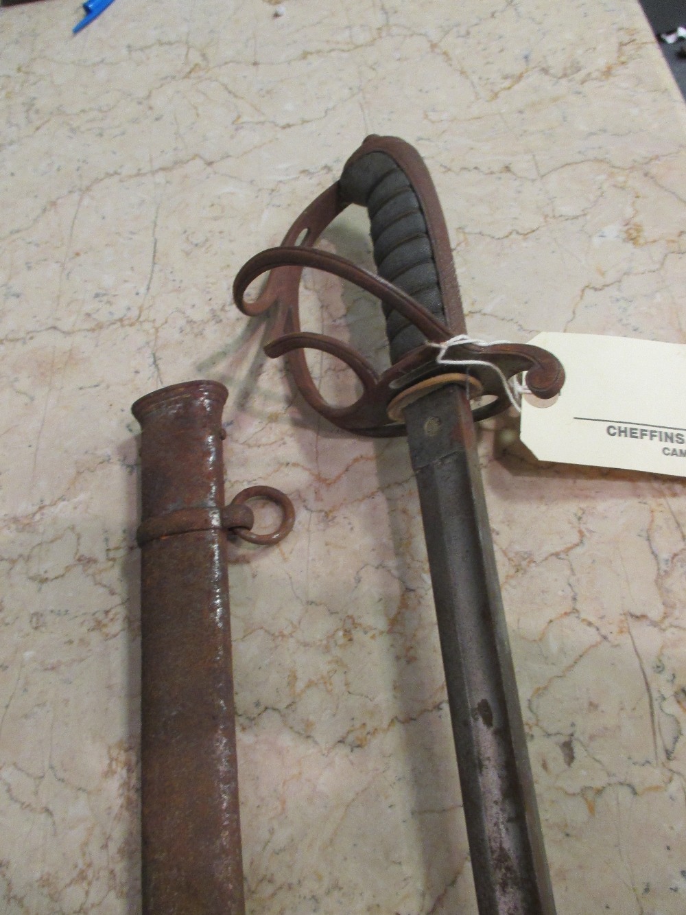 A Royal Artillary officer's sword, the etched blade with proof mark and makers E. Thurkle, Simpson