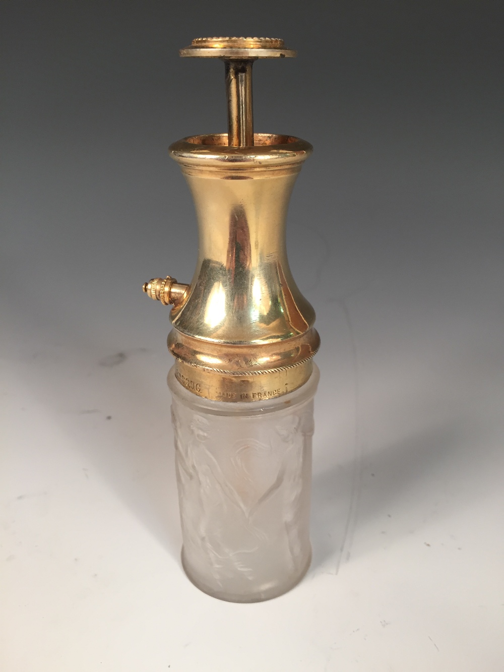 A René Lalique Figurines et Guirlandes pattern frosted glass atomiser, with gilt metal mounts, - Image 2 of 8